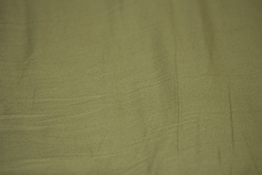 Rumpled Sheet - Thumbnail of a subdued olive green digital texture of fabric texture