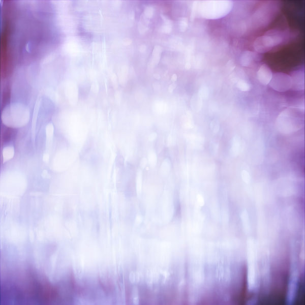 Purple Bokeh – a soft purple & white abstract texture of reflections on glass