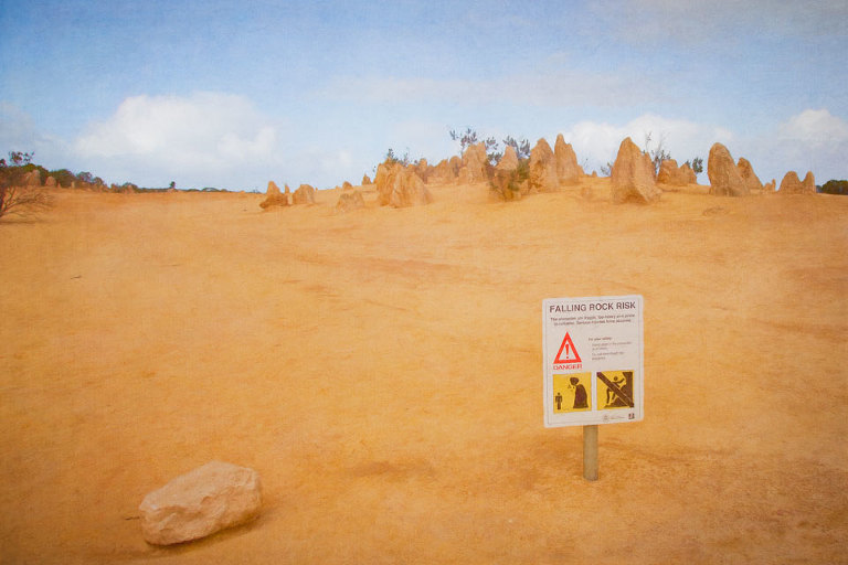 Sign warning of Falling Rock Risk in the Pinnacles Desert, Nambung National Park
