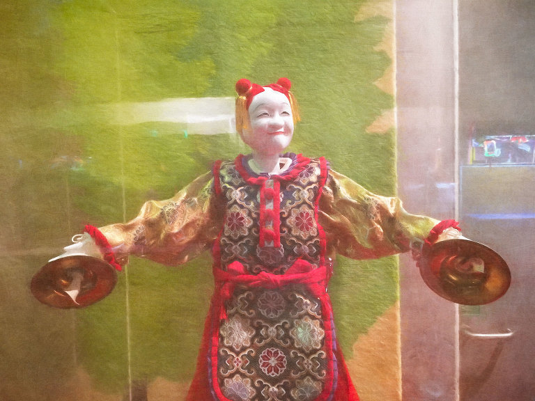 Puppet with cymbals